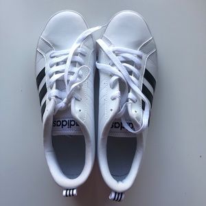 White and black striped Adidas sneakers 👟